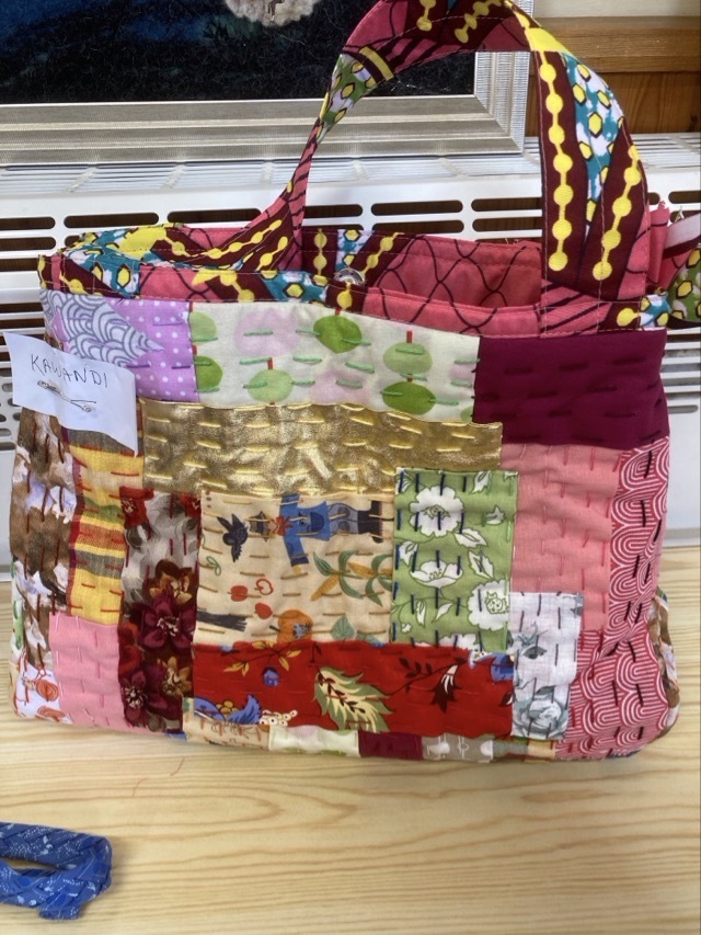 Bag made by Barbara using African fabric she bought while in Africa.. it has been quilted the authentic way using scraps and using kantha stitch